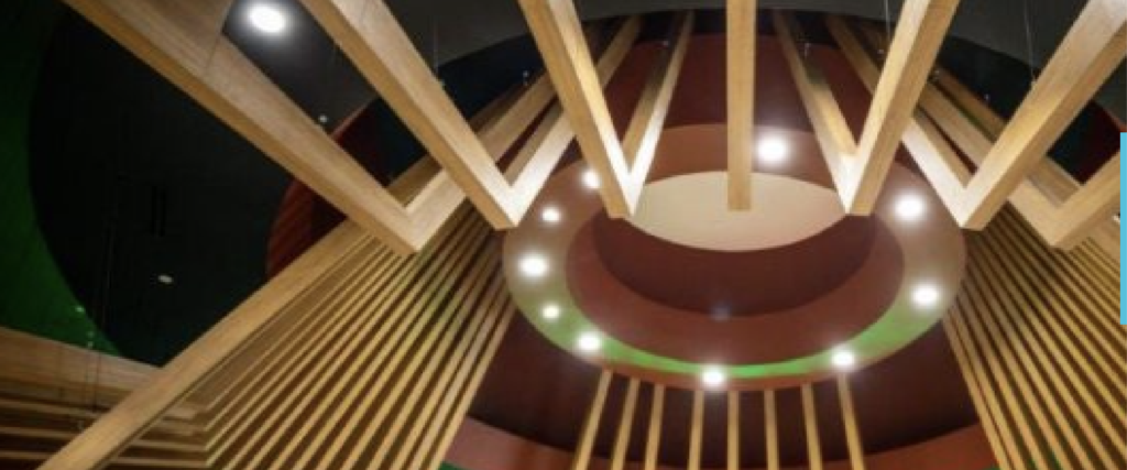 angled wood details around a circular light feature